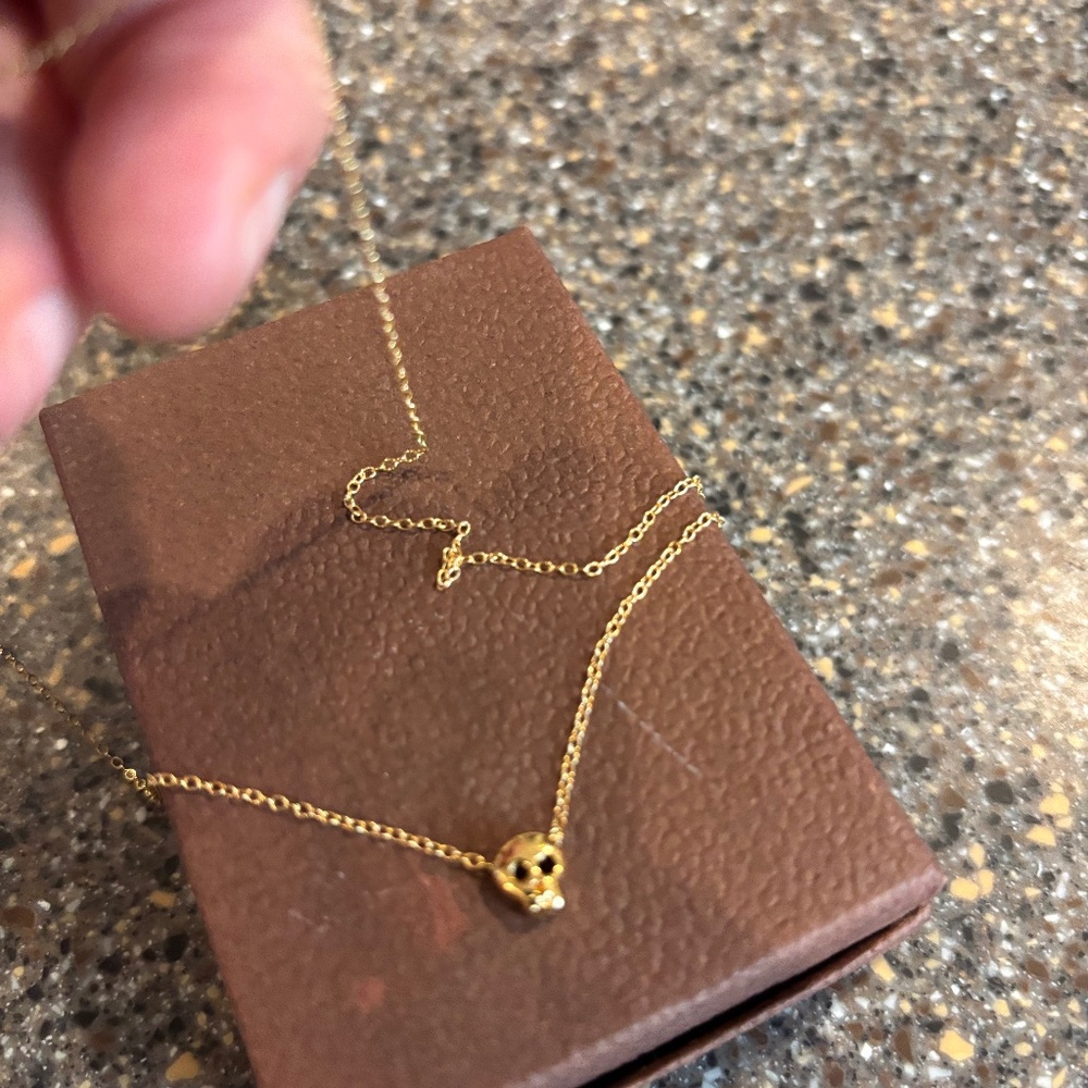 Michelle Chang baby skull necklace